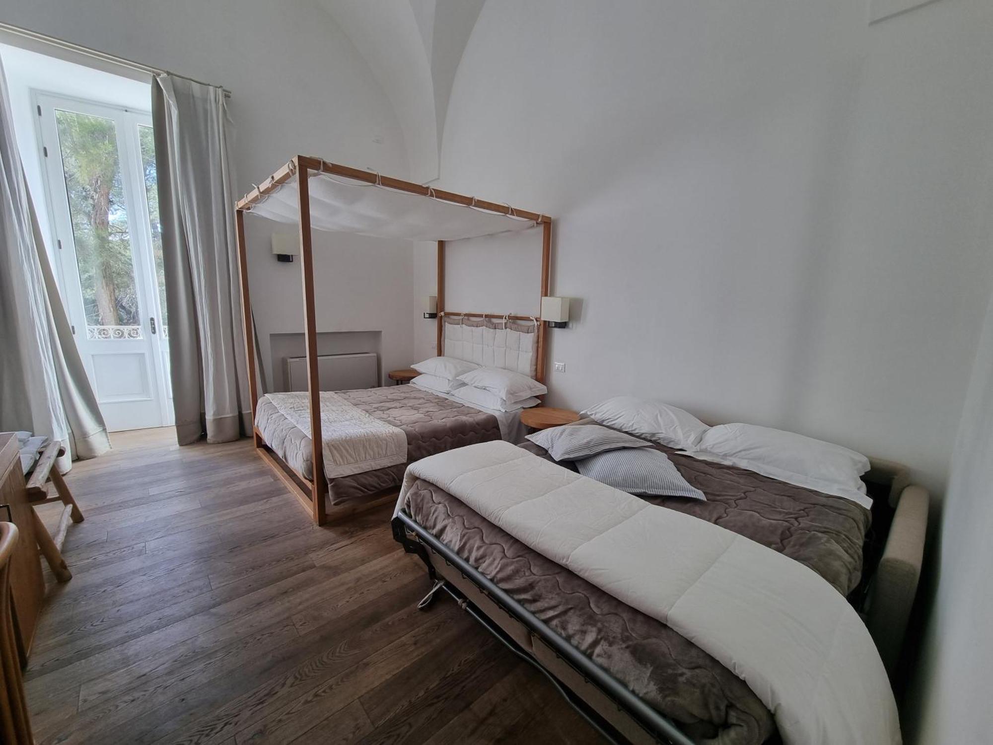 Il Palazzotto Luxury Suites Лече Стая снимка
